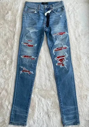 Amiri Washed Blue And Red Cashew Thrash Jeans